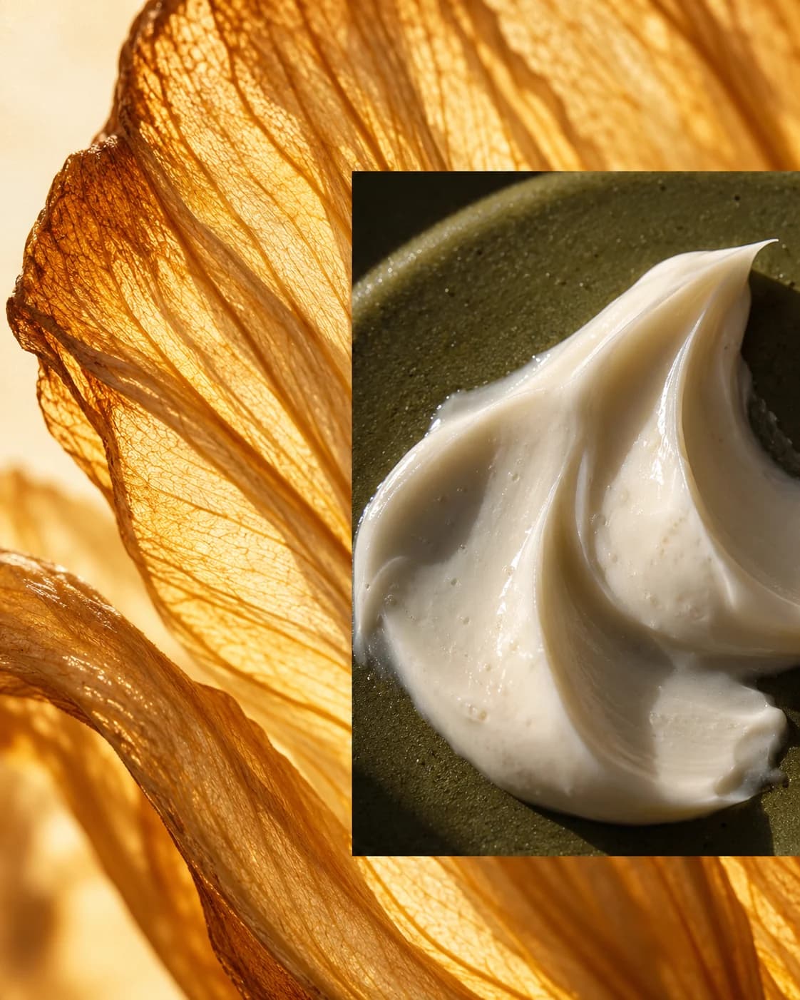 Golden petal detail behind glossy white cream folds on dark olive ceramic
