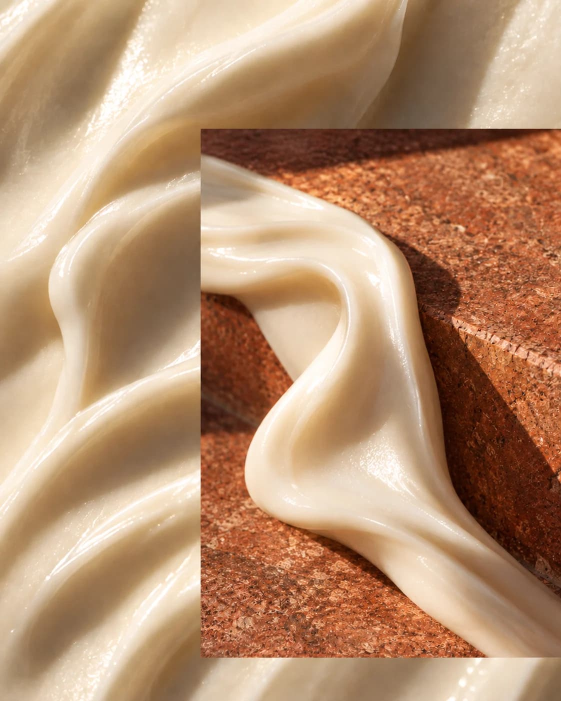 Ivory emulsion folds behind a glossy cream ribbon on rust-red stone